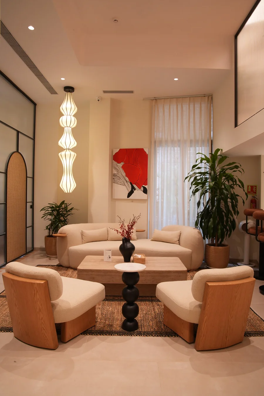 The entrance lounge at Unlock Everyday with seating, artwork and greenery