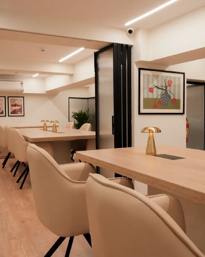 Shared tables and seating in the Unlock Everyday coworking room