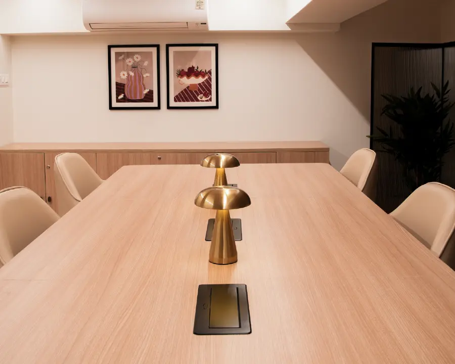 A long conference table in the Unlock Everyday coworking room