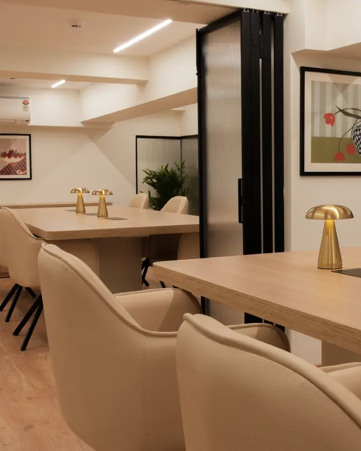 A shared table in the Unlock Everyday coworking room